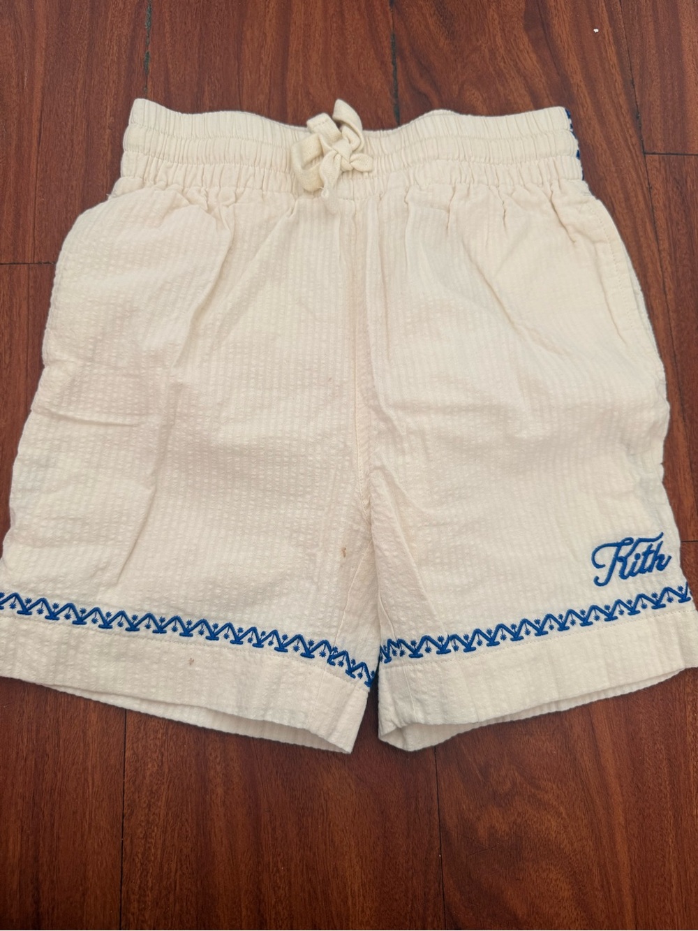 Kith Kids Cream Shorts with Blue Embroidery